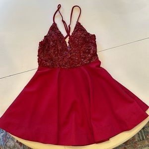 Crimson party dress. Size small. In good condition worn a few times.